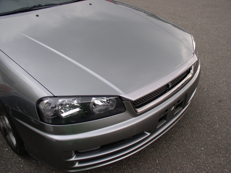 URAS - R34 Skyline Bonnet Lip D1 Spec II