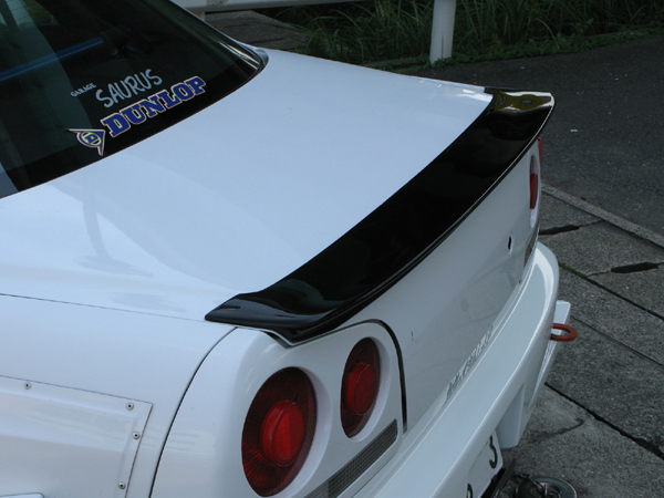 URAS - R34 Skyline 4 Door Trunk Lip